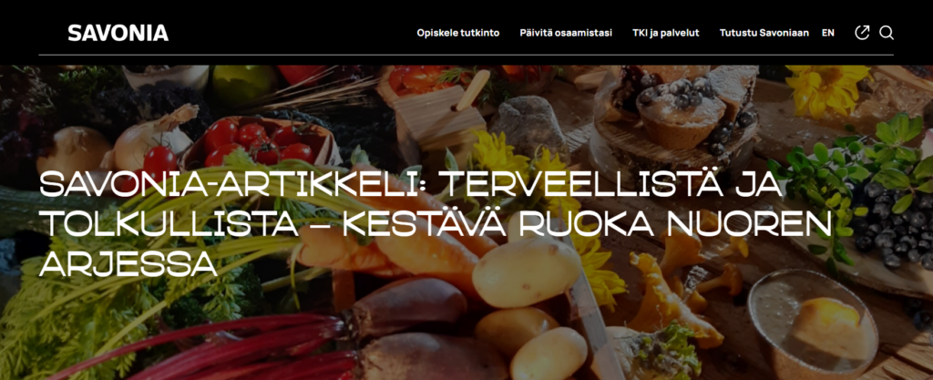 Artikkelin kansikuva, jossa pöytä täynnä erilaisia ruoan raaka-aineita.